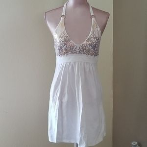 White halter dress with gold sequins
